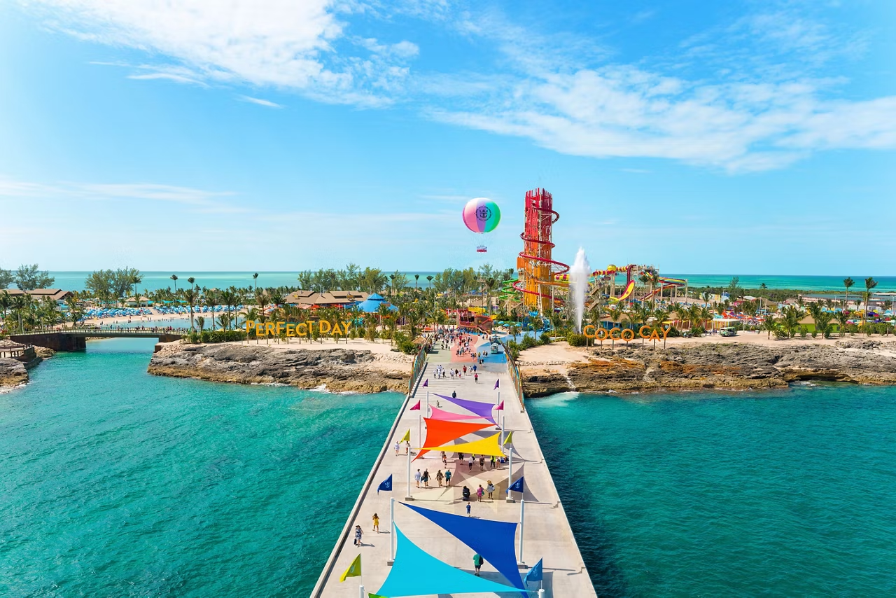 Perfect Day at CocoCay with colorful water slides, a pier, and bright turquoise Bahamian water